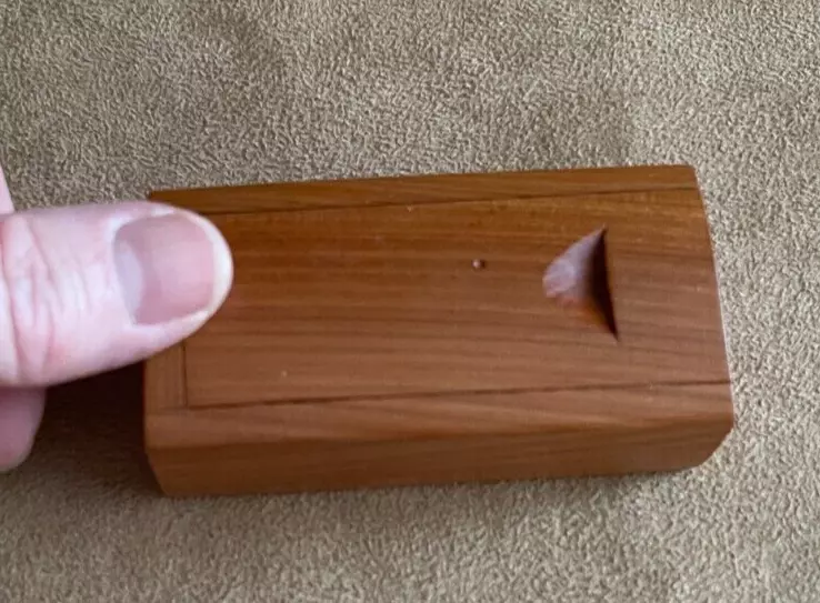 Small wooden box with cheap door