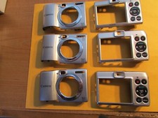 Three set of used parts for Canon A1300 cameras, front back sides