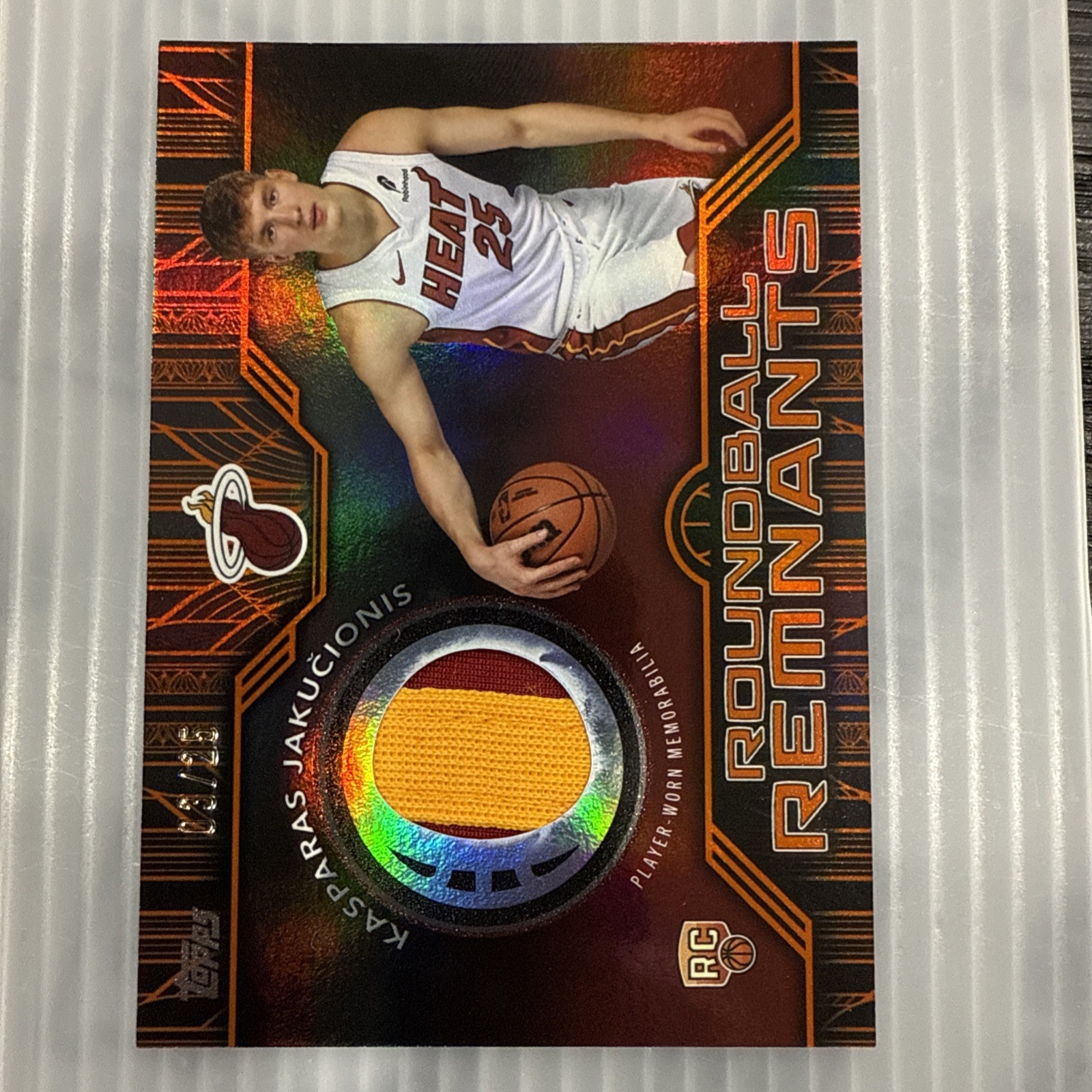 2025-26 Topps Rookie Roundball Remnants Orange Rainbow Kasparas Jakucionis /25