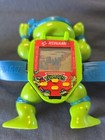 TMNT Teenage Mutant Ninja Turtles SHREDDER SHELLED Konami LCD Wrist Game Works