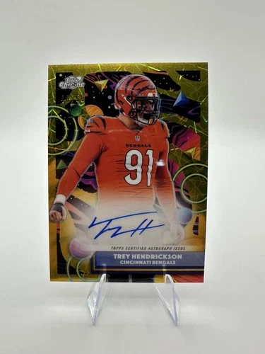 2025 Topps Cosmic Chrome Trey Hendrickson #CCA-TH Gold Interstellar Auto /50