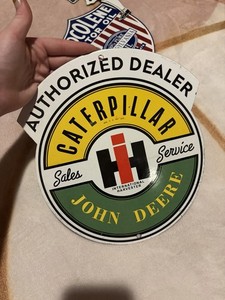 Porcelain Caterpillar IH John Deere Sign