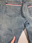 Blue Karen Kane Lifestyle jeans women’s 6 with pink and green vertical stripes and a red stripe on the back pocket.