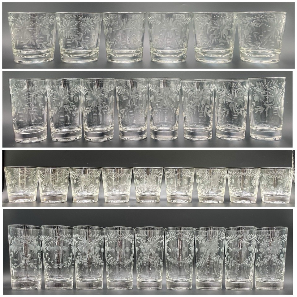 A complete 32-piece Federal Glass etched floral barware set for 8 — the kind of mid-century cocktail party arsenal that makes a home bar look like a time capsule from 1962.