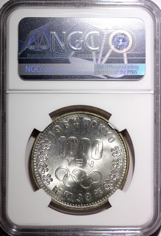 JAPÓN Plata S39 1964 1000 Yenes Juegos Olímpicos, Tokio NGC MS67 Buen Tono Y# 80 (002) Foto 3 de 4