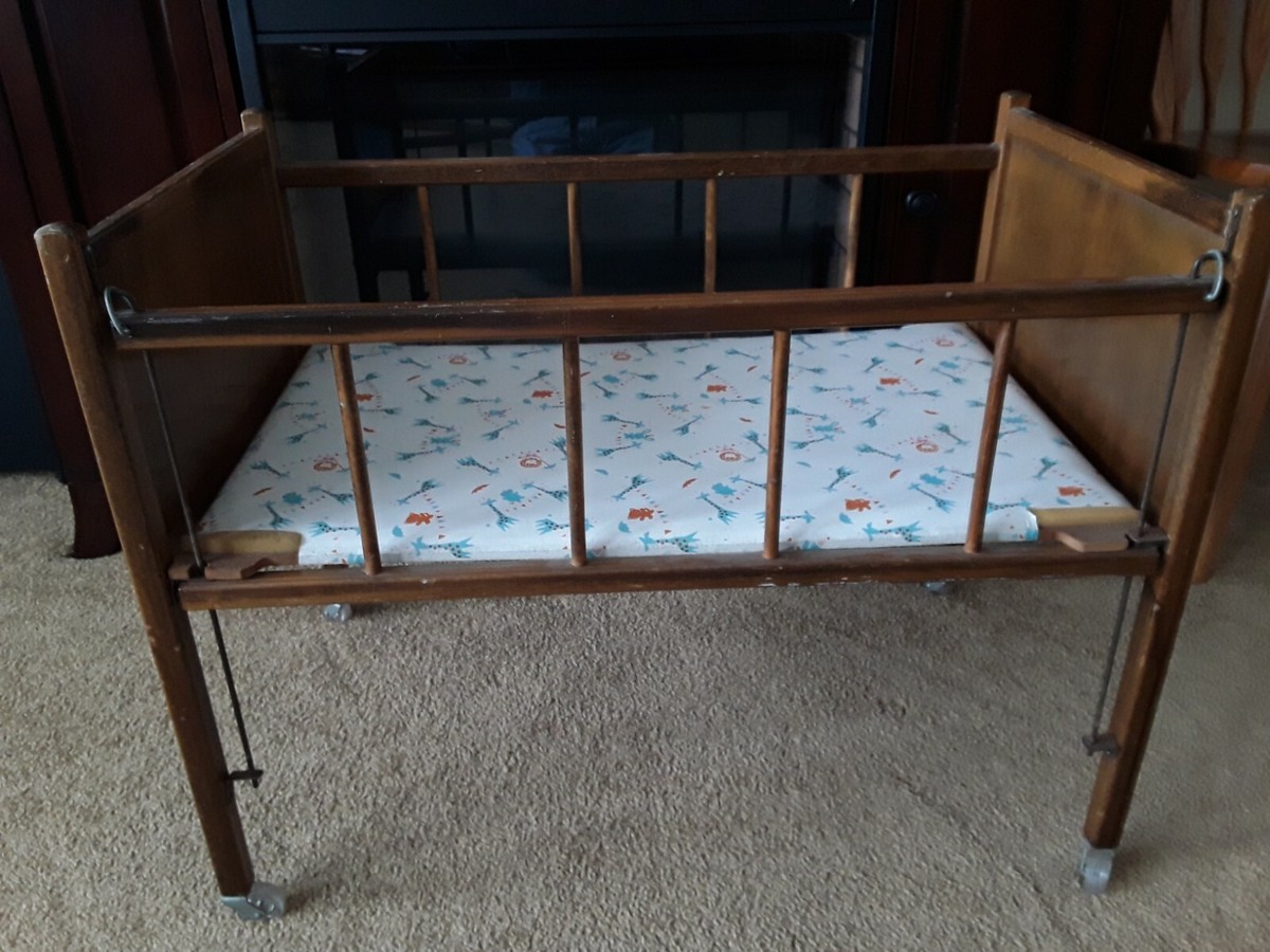vintage wooden doll crib