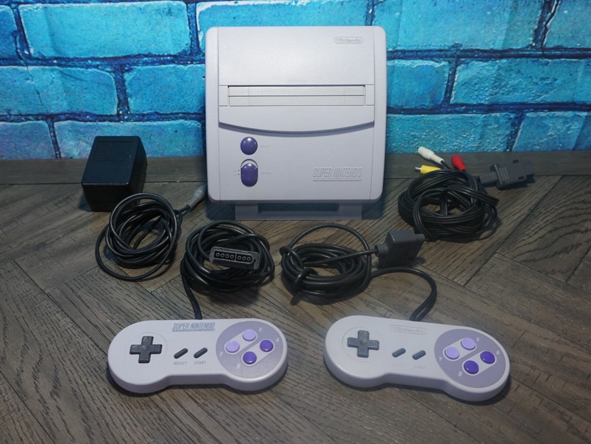 Authentic Super Nintendo SNES Game Console Jr. SNS-101 with Authentic Super Nintendo SNES Game Console Jr. SNS-101 with
