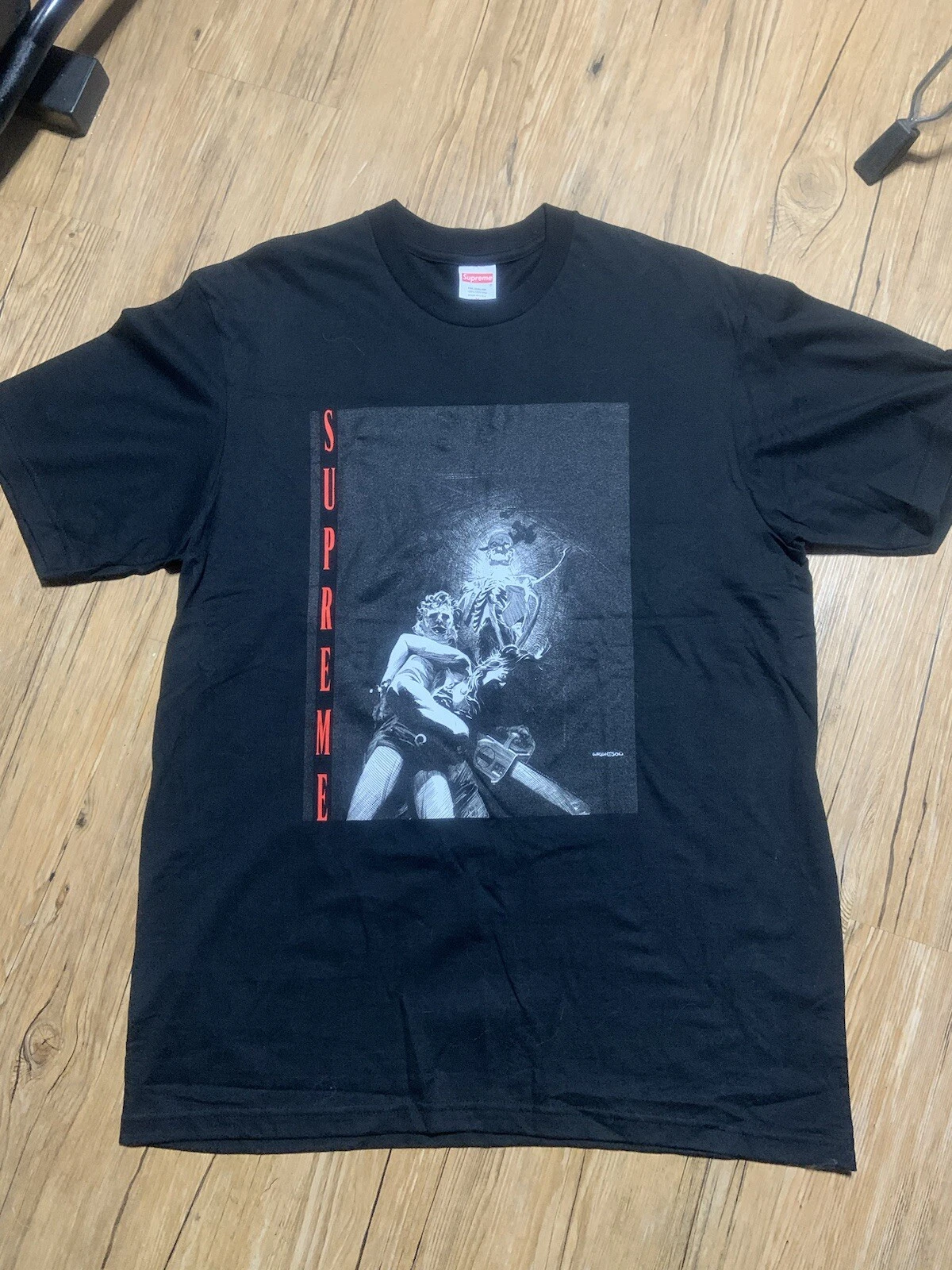 T shirt d'horreur suprême. Neuf. Face cuir moyenne. Massacre à la tronçonneuse Texas