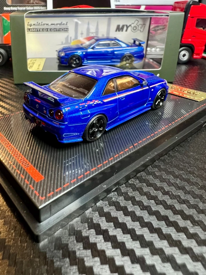 Encendido Modelo 1/64 Nissan GT-R R34 Bayside Azul Tokio Salón Automóvil IG3838 Diecast Foto 2 de 4