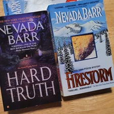 Lot of 2 Nevada Barr PBs Firestorm &Hard Truth