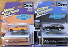 JOHNNY LIGHTNING BLACK AND ORANGE 1965 CHEVY MALIBU (B1)