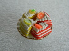 (C2) 1/12th scale DOLLS HOUSE HANDMADE FOUR MINI CAKE SLICES  FIXED ON PLATE