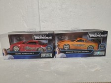 JADA TOYS FAST  FURIOUS BRIAN'S TOYOTA SUPRA ORANG 1:24 DIECAS MODEL DOM'S RX7