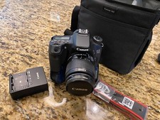 Canon EOS 70D 20.2MP DSLR Camera w/18-55 mm IS STM Lens w/Battery Grip and Bag