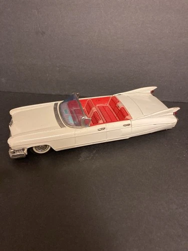 1959 Cadillac Convertible Friction toy made by Bandai. Off White W/ Red Interior