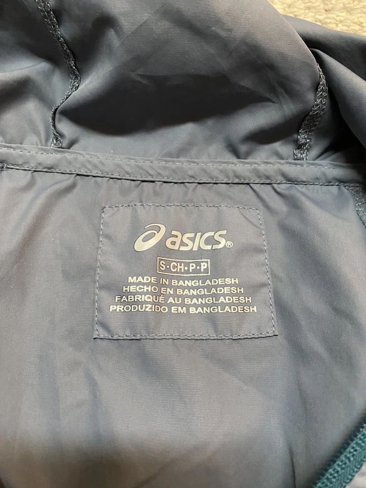 Chaqueta Asics Para Hombre Pequeña Azul Con Capucha Correr Ultraligera Resistente al Agua Golf Foto 4 de 4