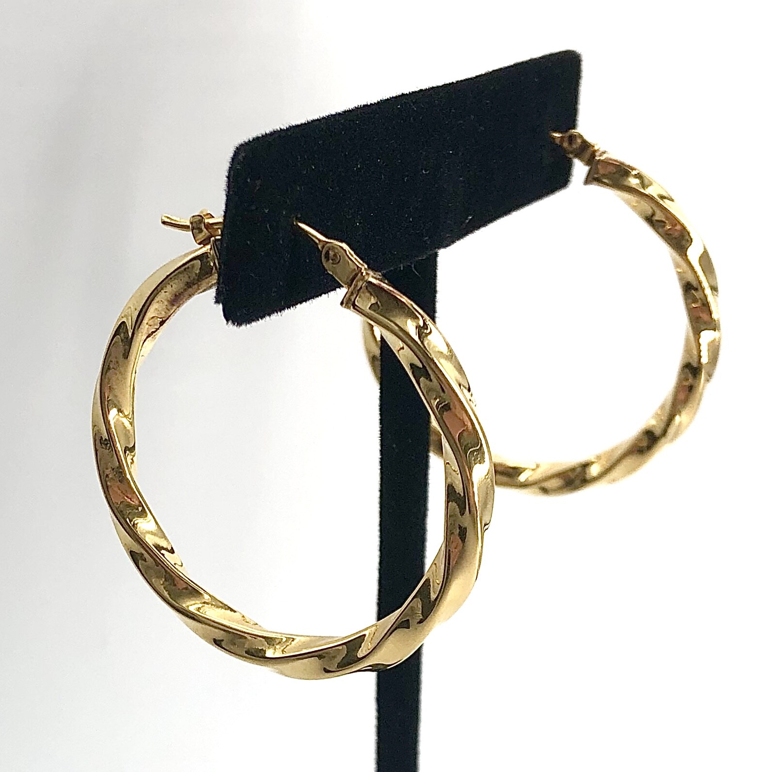 Goldtone Stainless Steel Twisted Hoop Earrings Signed-image