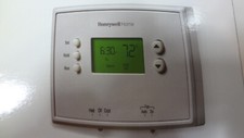 HONEYWELL RTH2510B 7-DAY PROGRAMMABLE THERMOSTAT WITH DIGITAL BACKLIT DISPLAY