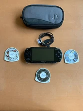 Sony PlayStation Portable Black With 3 Games, Charger And Case.