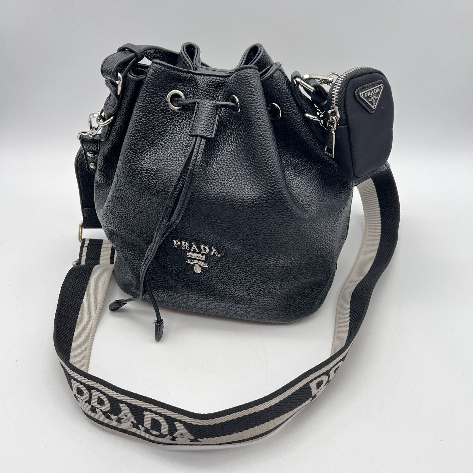 PRADA Black Pebbled Leather Drawstring Bucket Bag with Logo Strap & Pouch