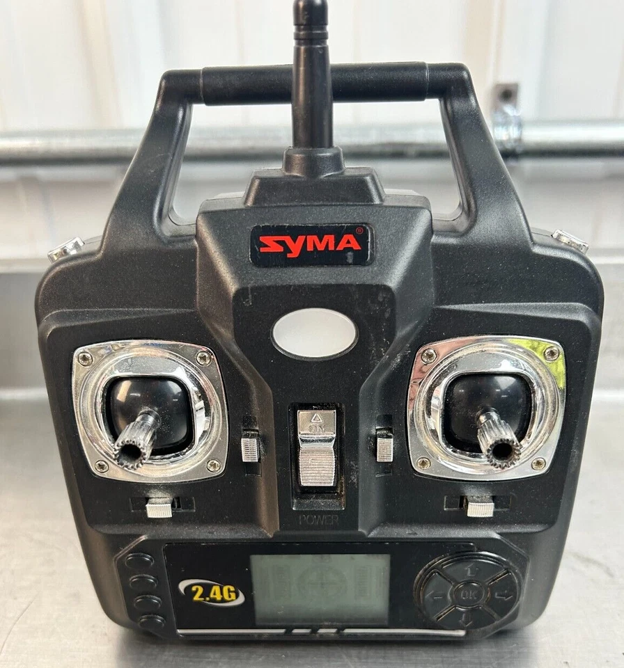 Transmisor de control remoto SYMA 2.4G para cuadricóptero dron | Usado Foto 2 de 4