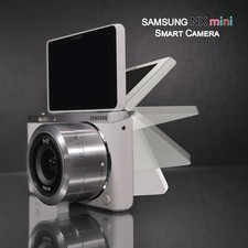 Samsung NX Mini Digital Camera kit with 9-27mm Lens  SEF7A External Flash  Bag