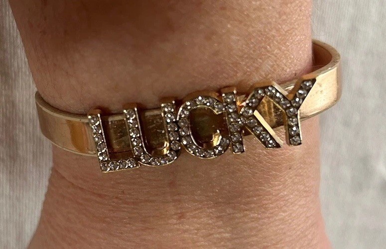 Super Cute Gold Tone “LUCKY” In Rhinestones On Gold Leather Watch Like Strap