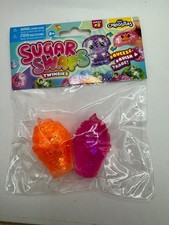 Sugar Swaps Twinsies Series 2 Squeeze  Squish Toy Set - Orange  Purple Shells