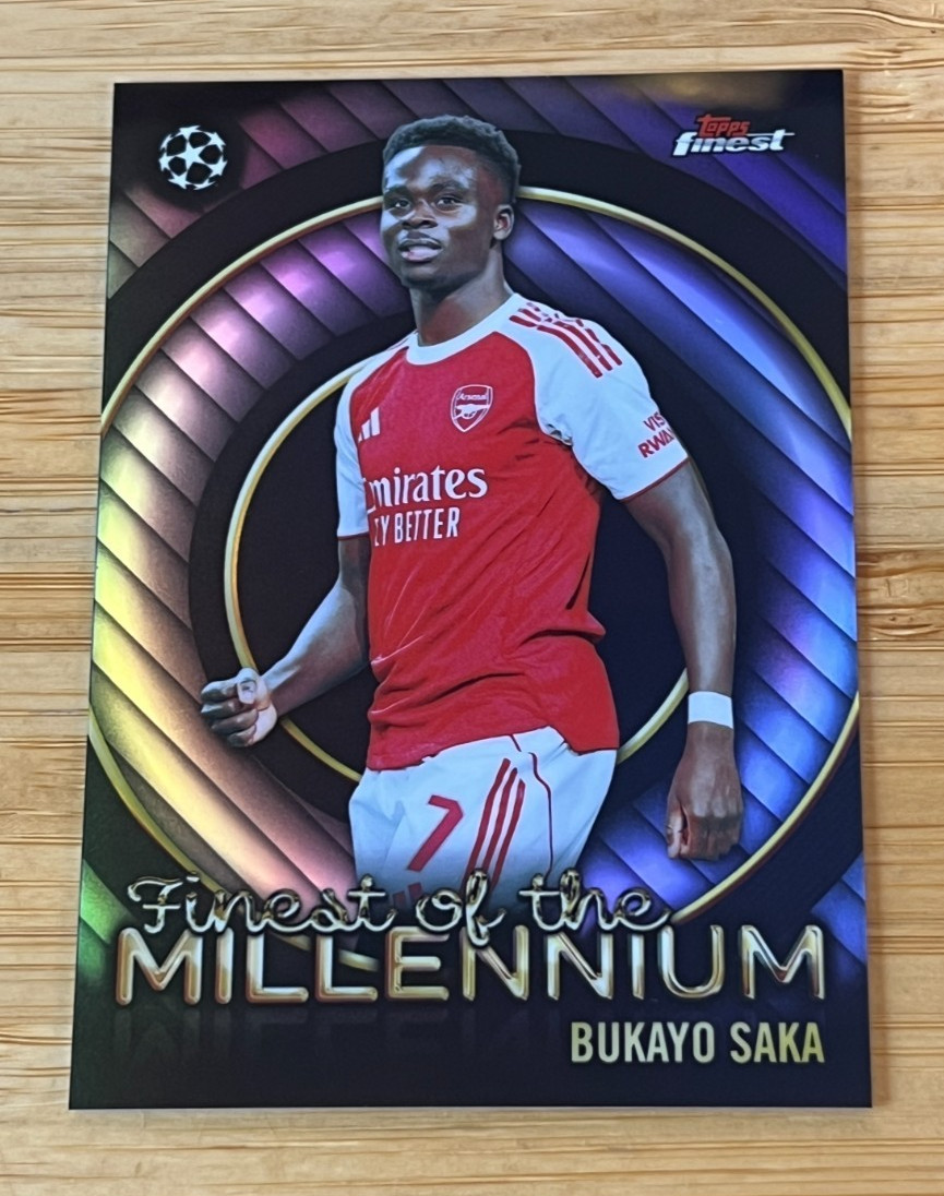 2025-26 Topps Finest UEFA Club Finest Of The Millennium FM-2 Bukayo Saka Arsenal view 1