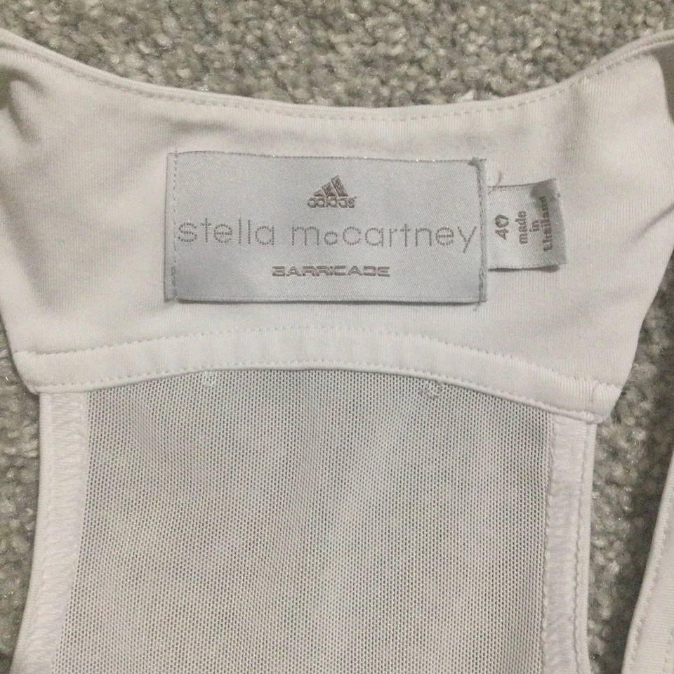 Camiseta sin mangas Adidas Stella McCartney Barricade para mujer de malla recortada So 40 blanca aguamarina Foto 2 de 4
