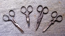 Four pairs vintage steel sewing scissors late 19th early 20th century