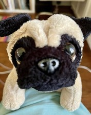Tan black bulldog stuffed animal, gently used, clean, slight rip on underside