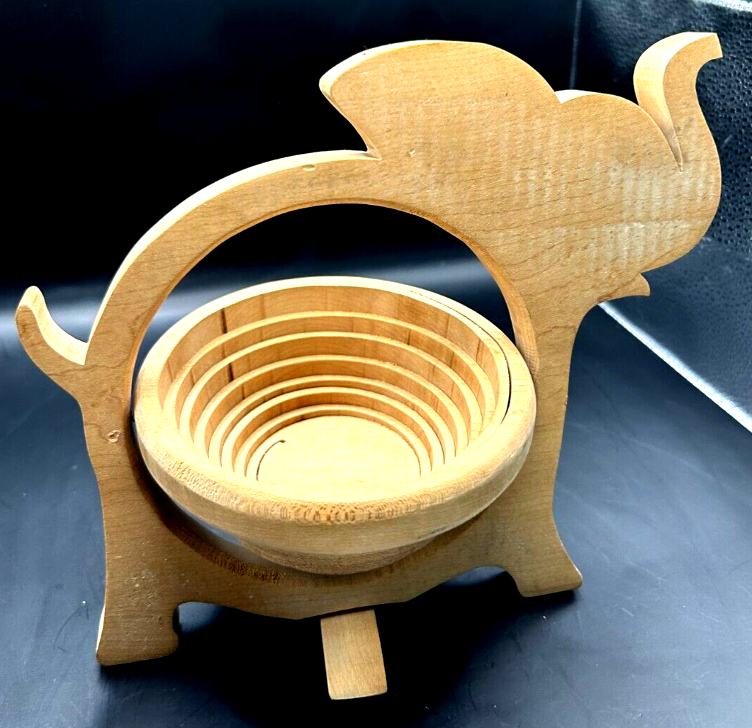 WOODEN TABLE TRIVET HOT PLATE SHAPED LIKE AN ELEPHANT OPENS TO A HANDLED BASKET