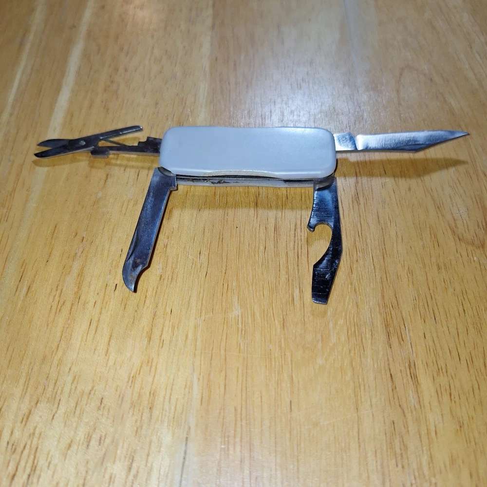 Compact Multifunctional Pocket Knife with Multiple Tools Compact Multifunctional Pocket Knife with Multiple Tools