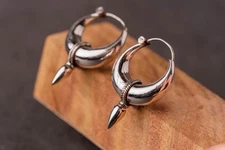 A Silver Stylish earring spiritually significant piece of jewelry