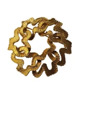 Vintage signed Crown Trifari gold tone ribbon round brooch pin