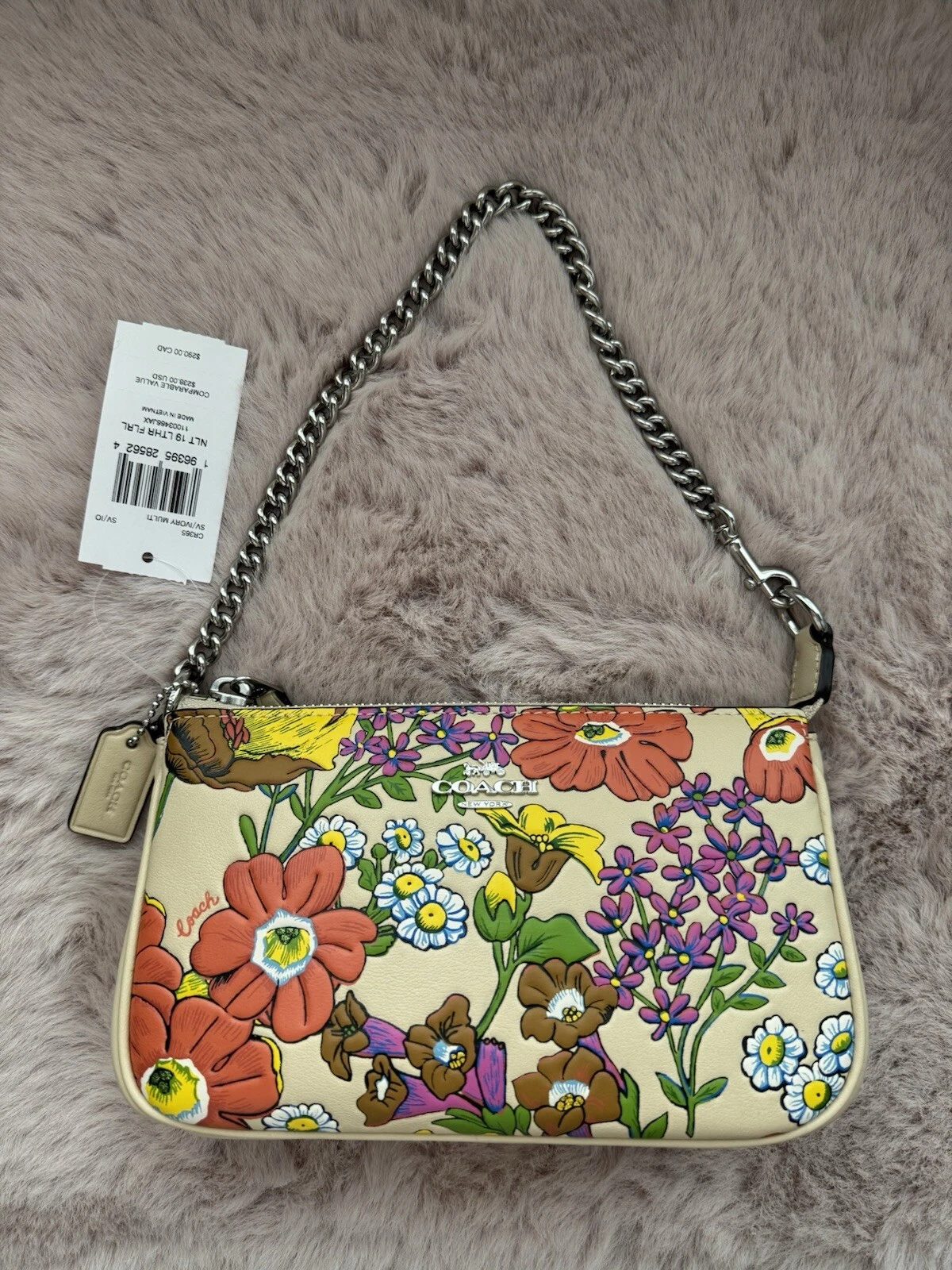Coach CR365 Nolita 19 con stampa floreale