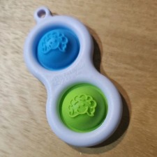Fat Brain Toy Co. Simpl Dimpl Lime/Blue Stress Toy Ready for Key Chain