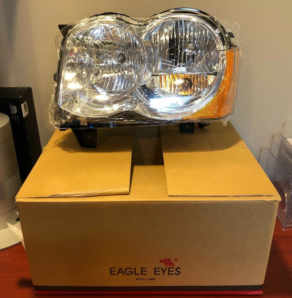 Conjunto de faros EAGLE EYE NUEVOS 2008-2010 Jeep Grand Cherokee - conductor izquierdo Foto 2 de 4