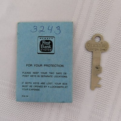 Vintage safe deposit box key Diebold with key envelope from First