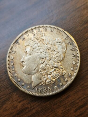 1886 S Morgan Dollar $1 Silver Higher Grade AU+ (Lamination On Cheek) - Picture 2 of 7