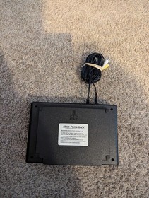 atari flashback gaming console. No controls, console and plugs only. Not tested.
