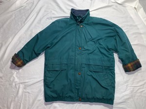 green jacket with plaid lining
