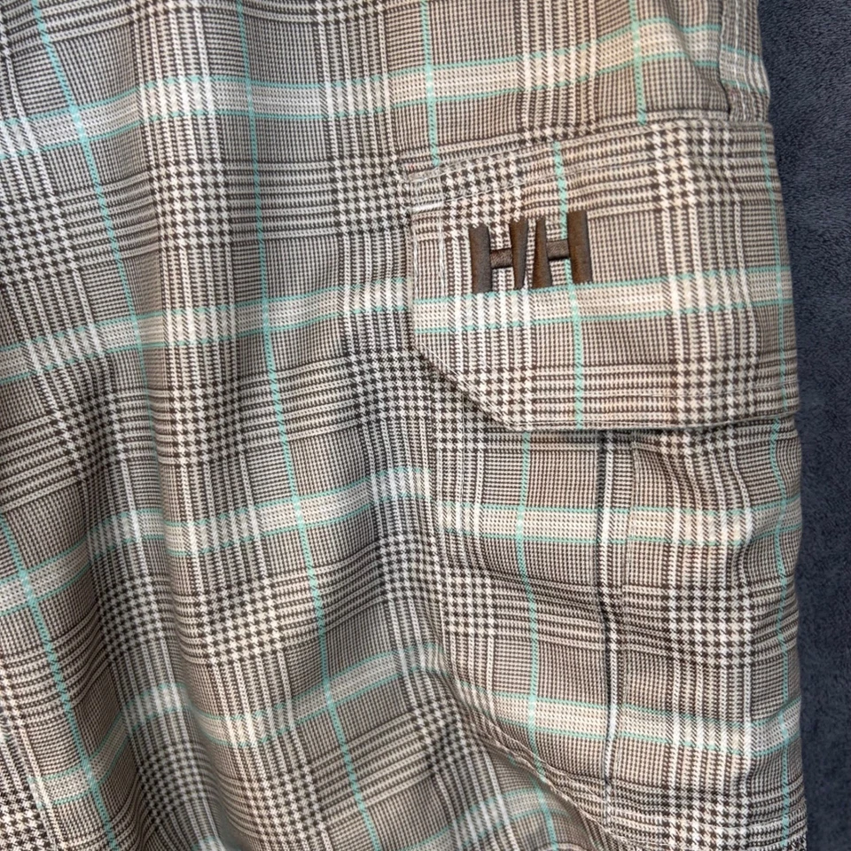 Pantalones de esquí snowboard Helly Hansen medianos 34x32 a cuadros marrón tostado aislados Foto 2 de 4