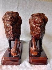 PAIR Antique Rockingham Pottery Glazed Lions 19th Century English Staffordshire