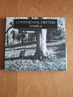 Continental Drifters: Vermillion, 1998, Blue Rose