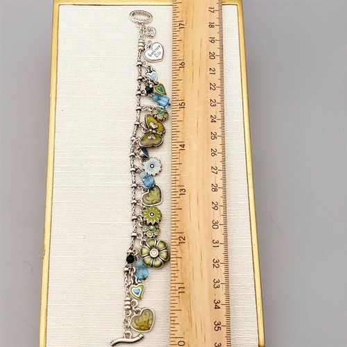 "Brazalete Dije Brighton Abraza Vida Mariposa y Flores 7-1/2" - Imagen 10 de 10