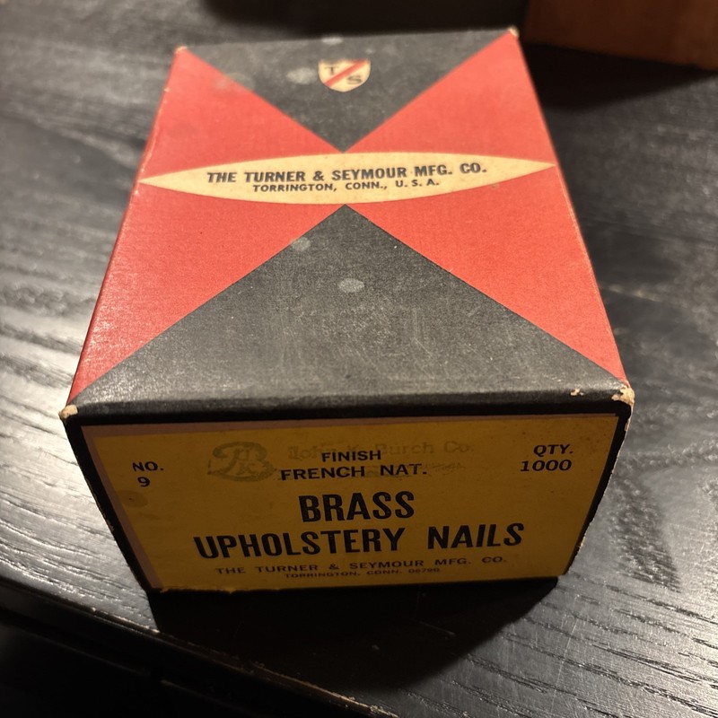 The Turner & Seymour Mfg. Co. Brass Nails in box. Approx. 239 as pictured 