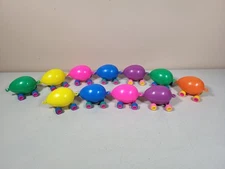 Lot of 11 Vintage Dudley's Easter Toys Plastic Easter Egg on Wheels