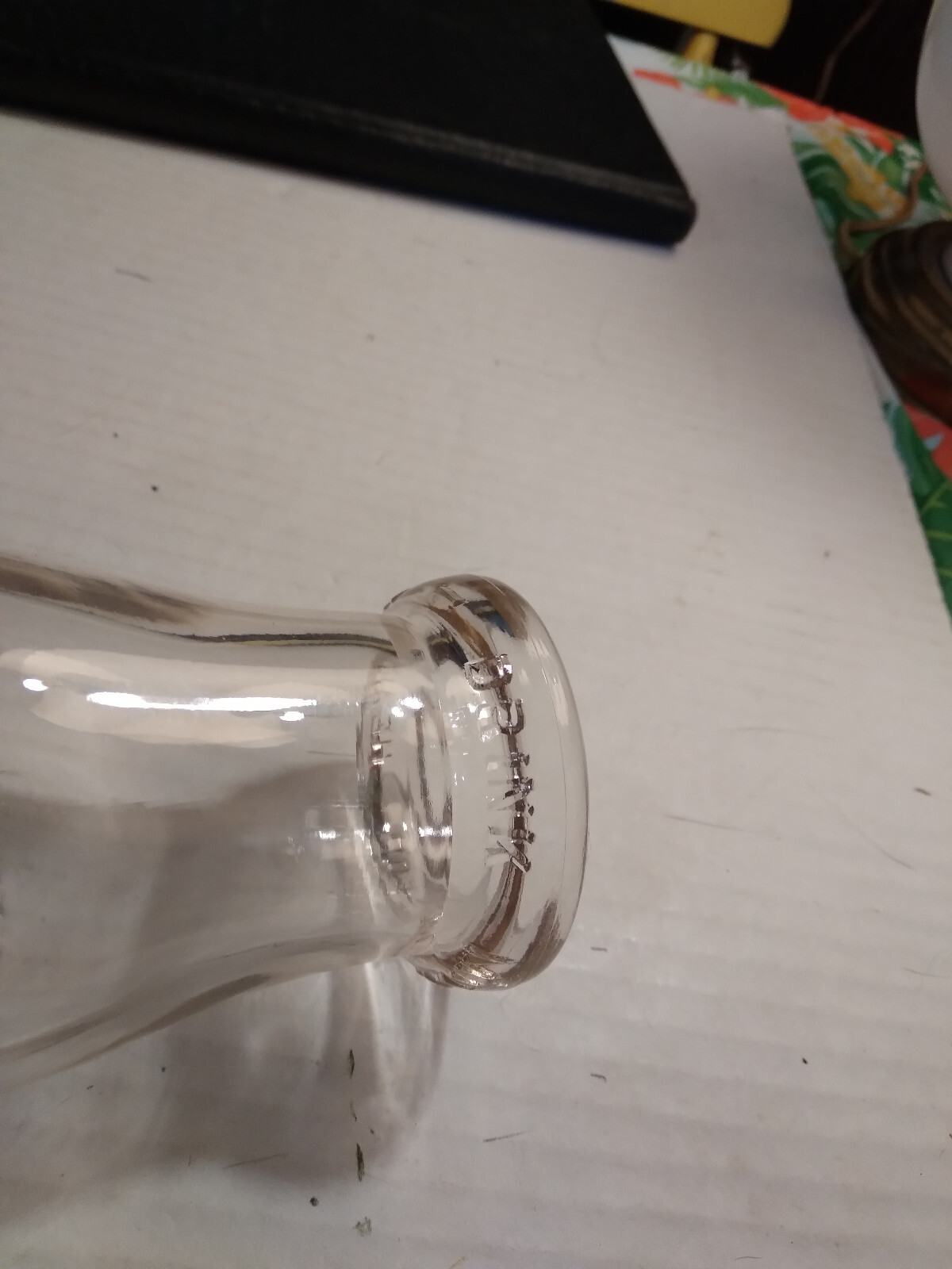 Logan,Ohio-1/2 pt.embossed Frasure & Brown milk bottle-(Hocking County)
